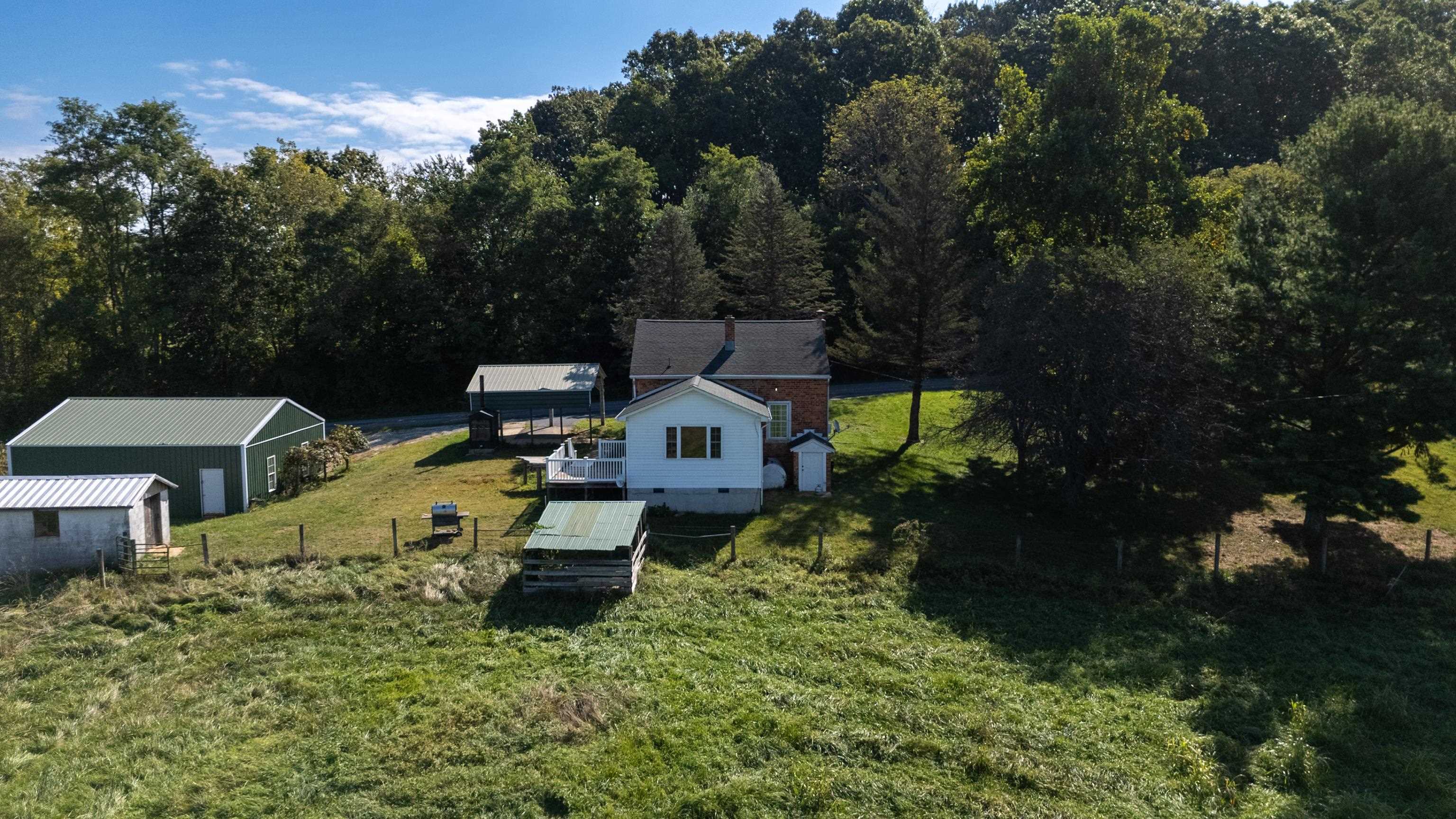 146 Mish Barn Road Middlebrook, VA 24459 - Photo 44 of 54 an aerial view of a house with garden space and street view