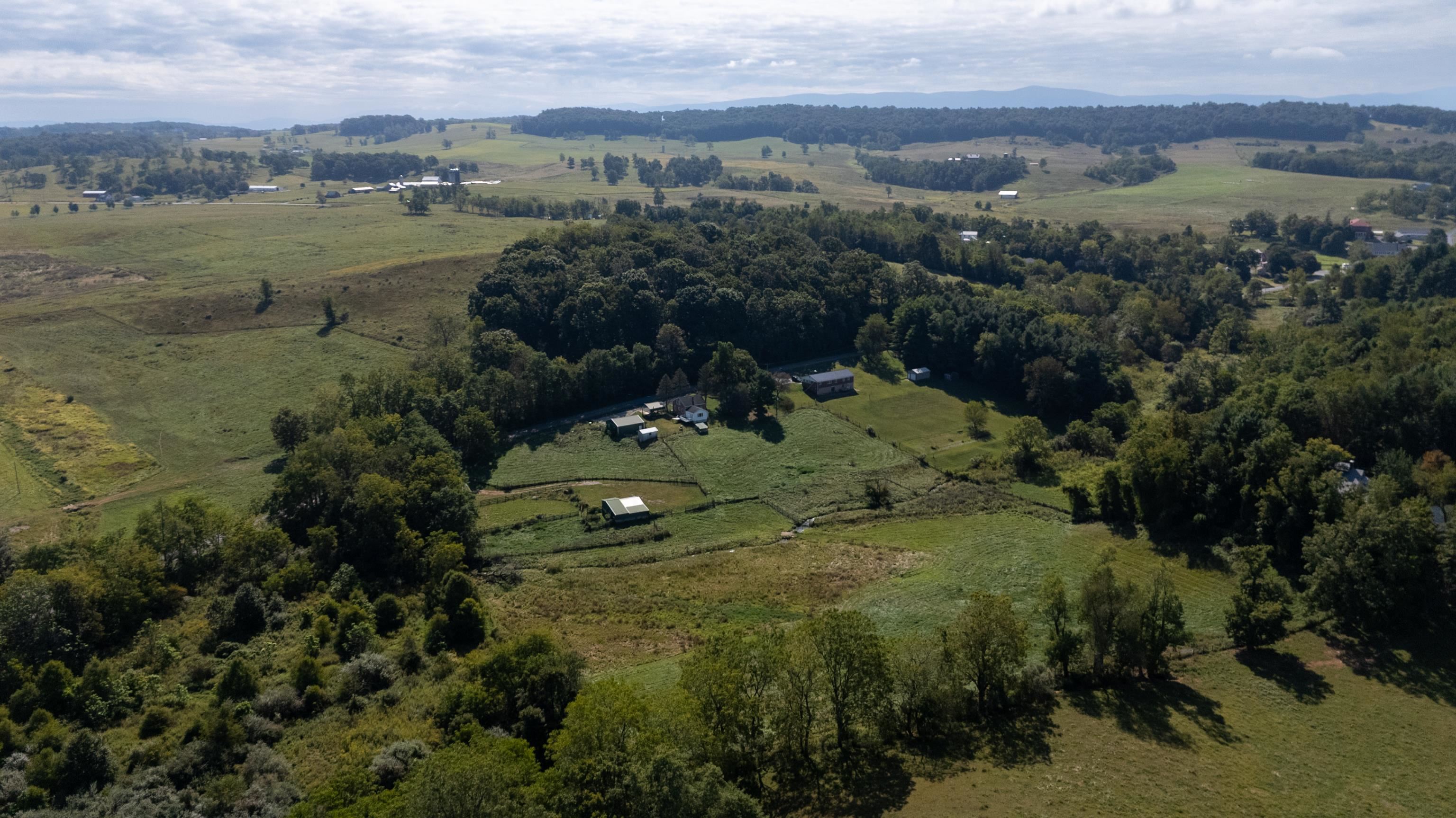 146 Mish Barn Road Middlebrook, VA 24459 - Photo 53 of 54 an aerial view of mountain with trees all around