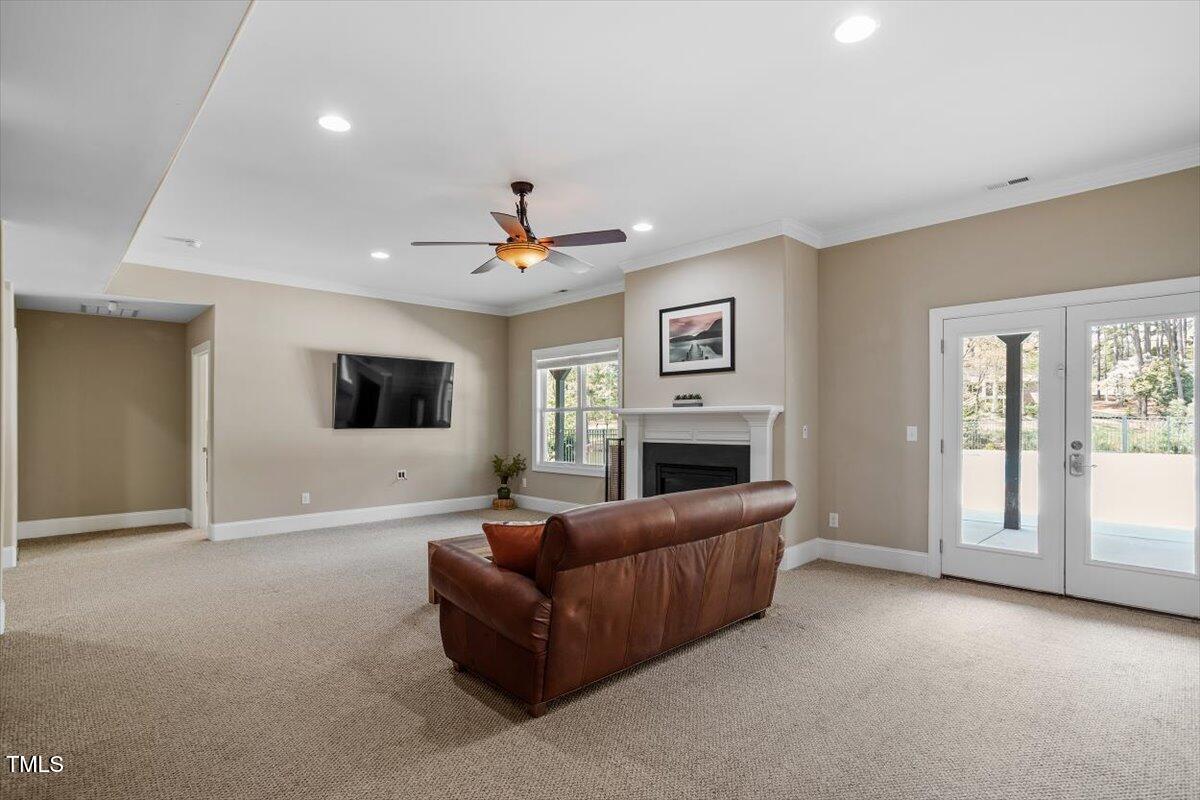 1422 Gormly Circle Sanford, NC 27330 - Photo 31 of 59 a living room with furniture and a fireplace