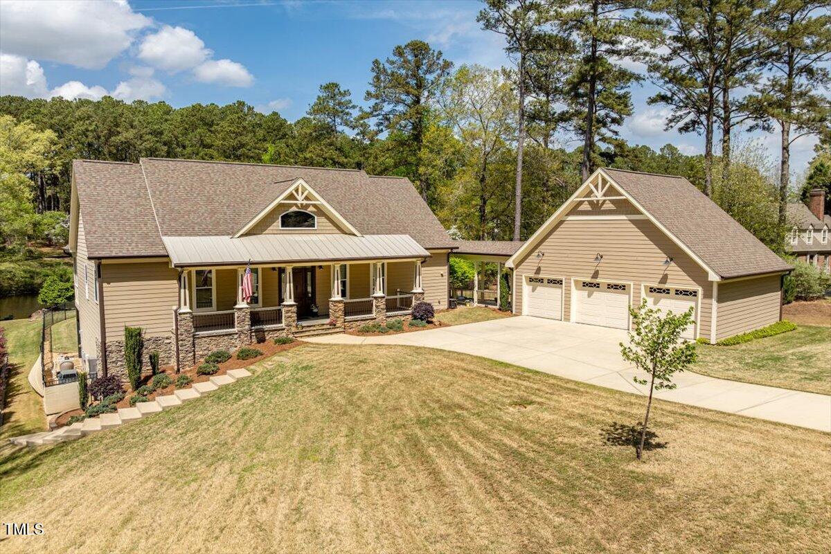 1422 Gormly Circle Sanford, NC 27330 - Photo 3 of 59 a house with trees in the background