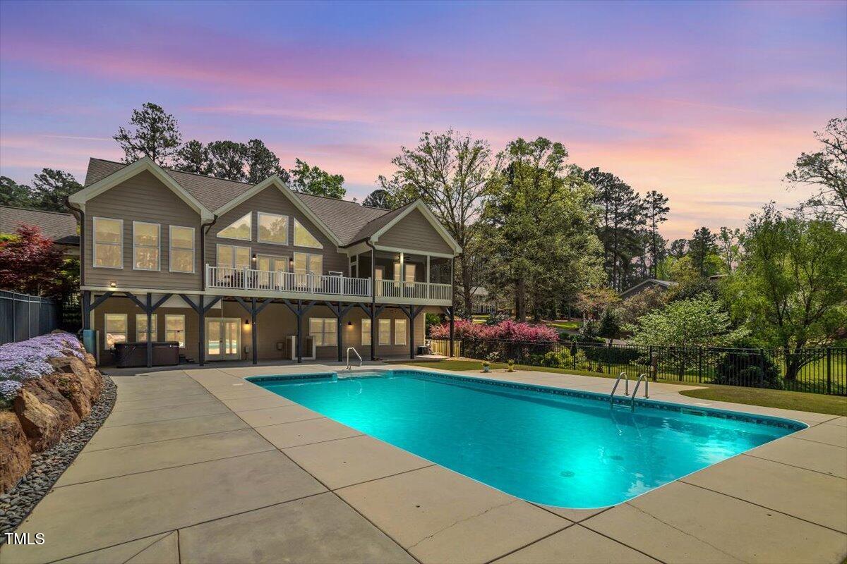 1422 Gormly Circle Sanford, NC 27330 - Photo 40 of 59 a view of a house with swimming pool and sitting area