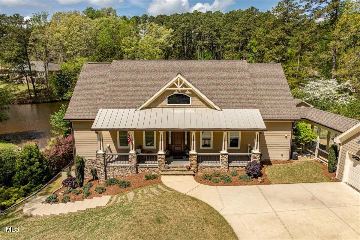 1422 Gormly Circle Sanford, NC 27330 - Photo 43 of 59 a aerial view of a house with swimming pool and sitting area