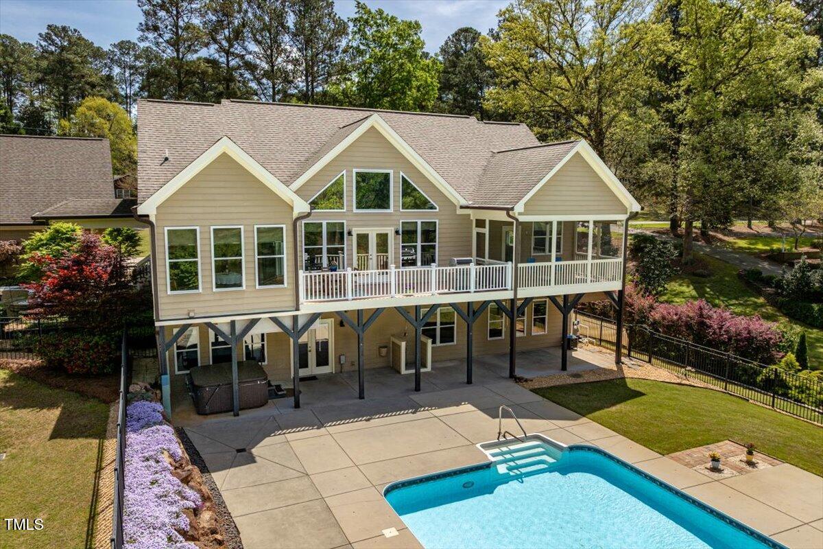 1422 Gormly Circle Sanford, NC 27330 - Photo 46 of 59 a aerial view of a house with swimming pool and porch