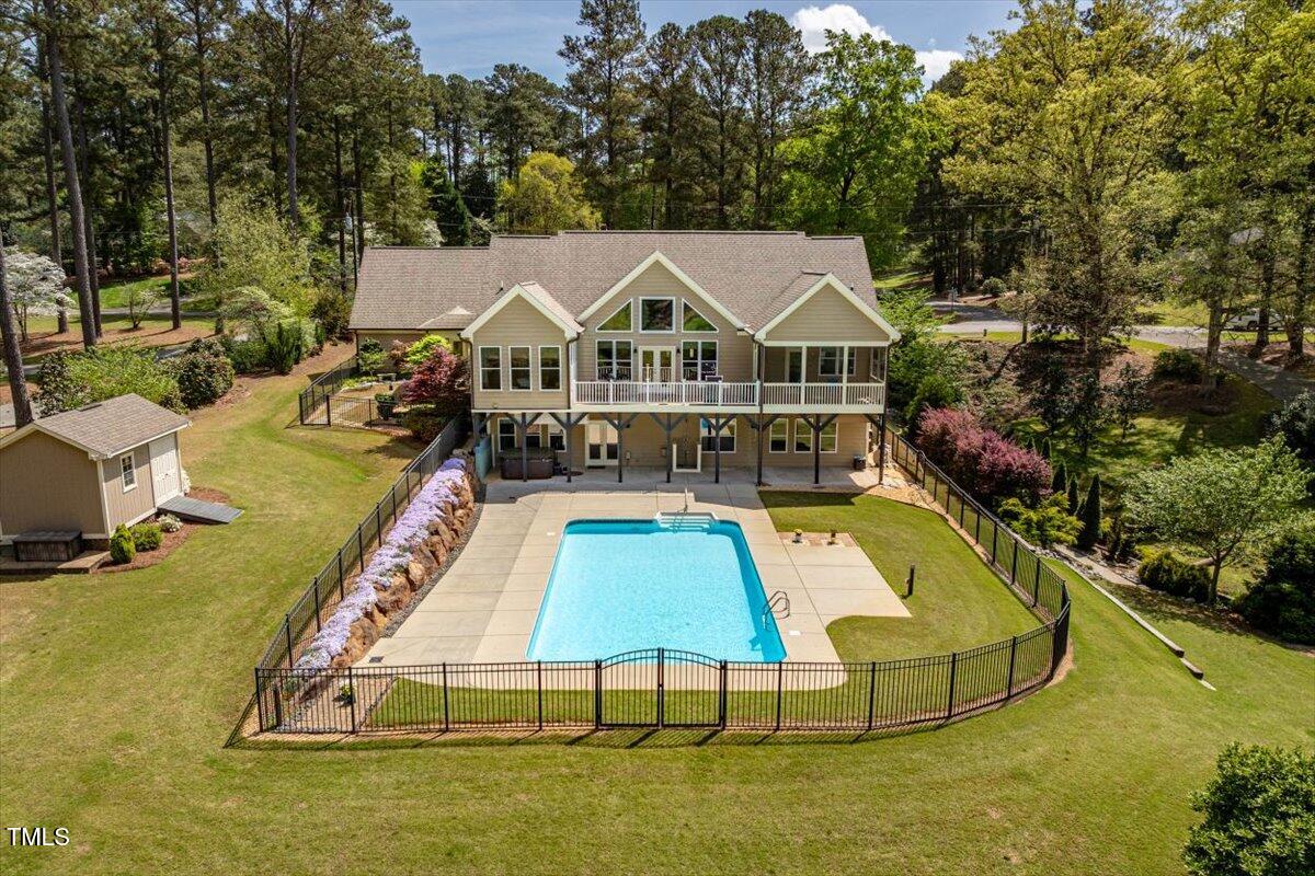 1422 Gormly Circle Sanford, NC 27330 - Photo 48 of 59 a view of a house with swimming pool