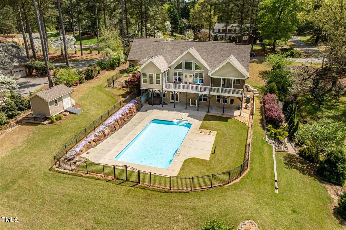 1422 Gormly Circle Sanford, NC 27330 - Photo 49 of 59 an aerial view of a house with swimming pool and outdoor seating
