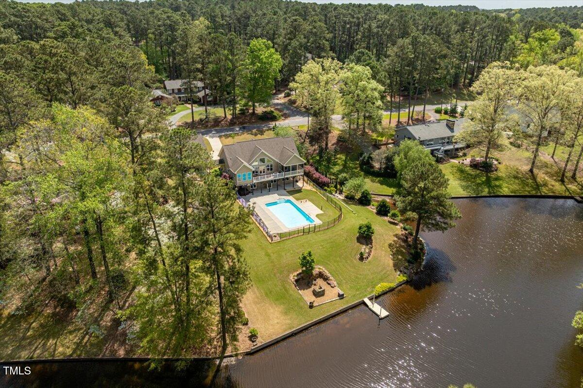 1422 Gormly Circle Sanford, NC 27330 - Photo 52 of 59 an aerial view of a house with yard swimming pool and outdoor seating