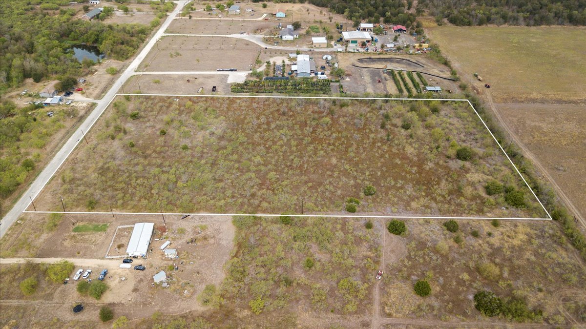 Tbd Ranchero Drive Buda, TX 78610 - Photo 6 of 10 Overview of rural landscape featuring property parcel outlined