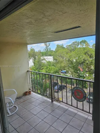 a balcony with chairs