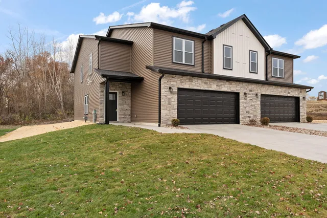 a house view with a garden space