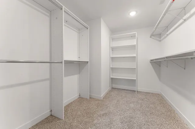 an empty room with a bathroom