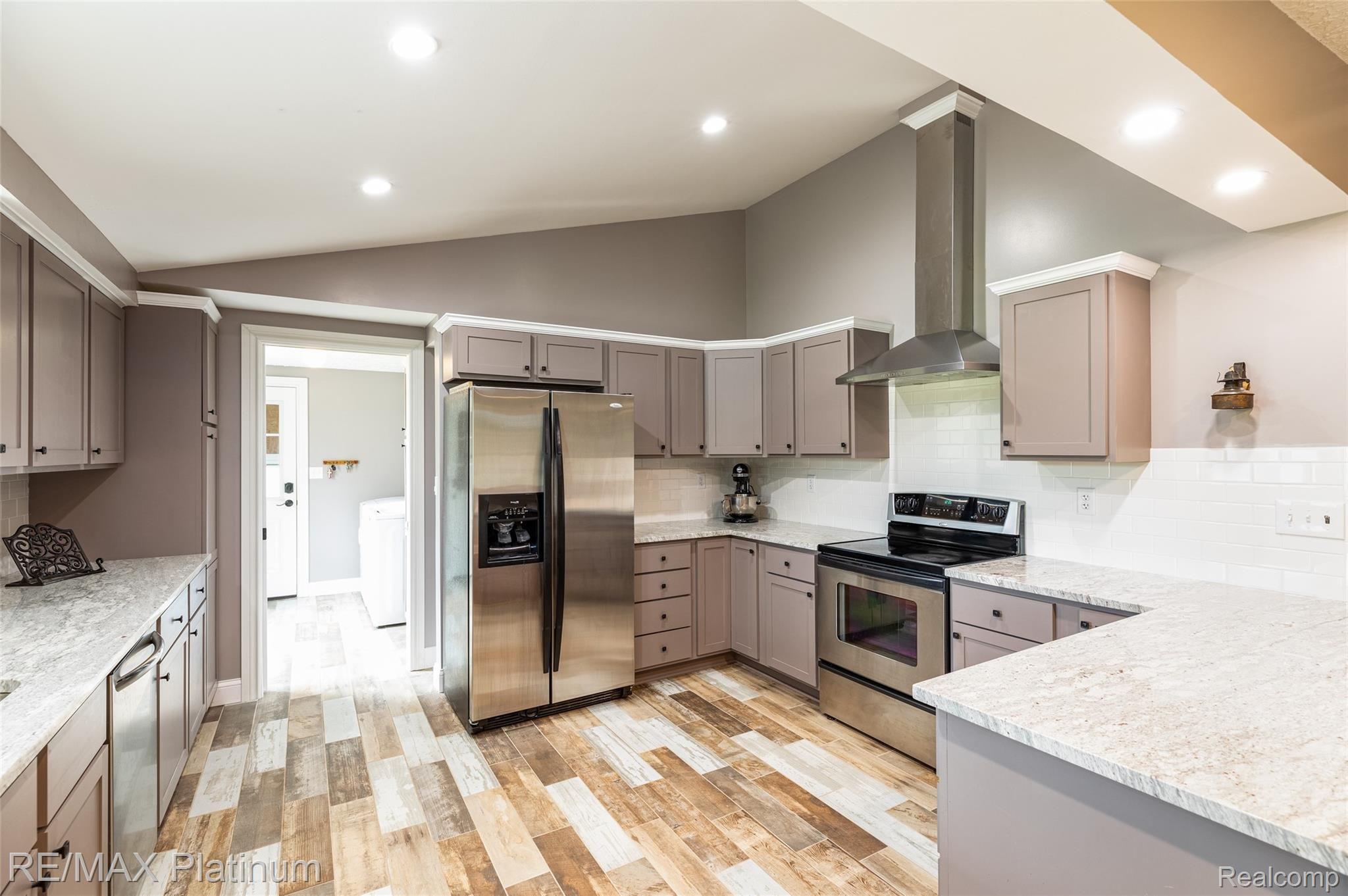 593 North Hacker Road Howell, MI 48843 - Photo 9 of 48 Great view of the new porcelain tile flooring!