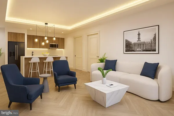 a living room with furniture and white walls