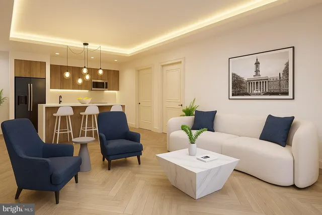 a living room with furniture and white walls