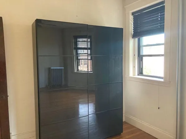 a view of empty room with windows
