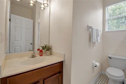 a view of backyard with patio