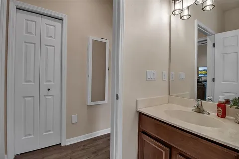 a view of a livingroom with furniture and a window