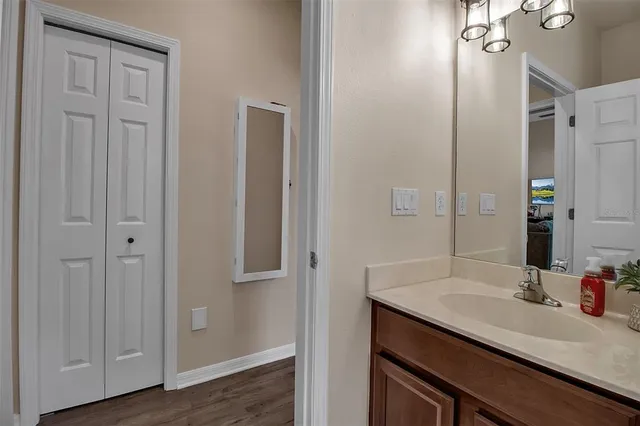 a view of a livingroom with furniture and a window