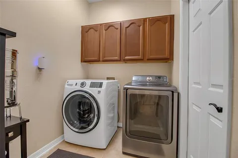 a view of an house with backyard space and garden