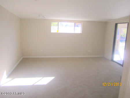 1221 East Ocotillo Road Phoenix, AZ 85014 - Photo 10 of 24 a view of empty room with window