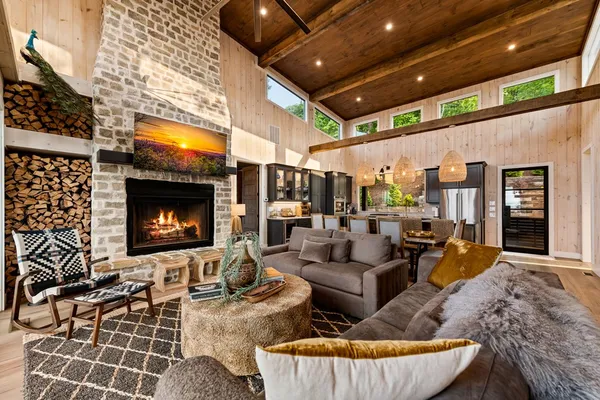a bathroom with a toilet a sink and shower