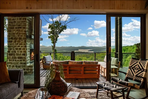 a view of a patio with a table chairs and a table