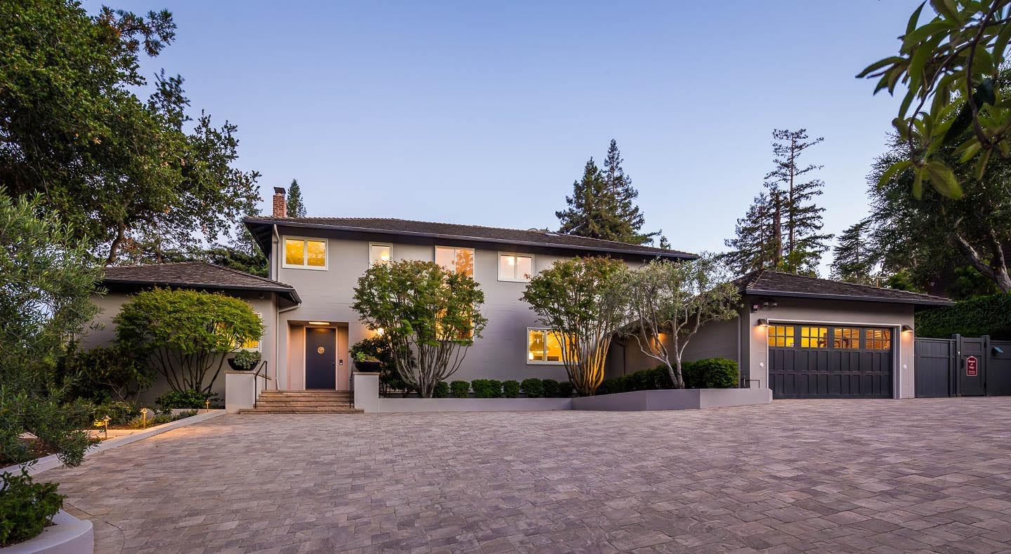 301 Ascot Road Hillsborough, CA 94010 - Photo 1 of 3 a front view of a house with a yard and tree s