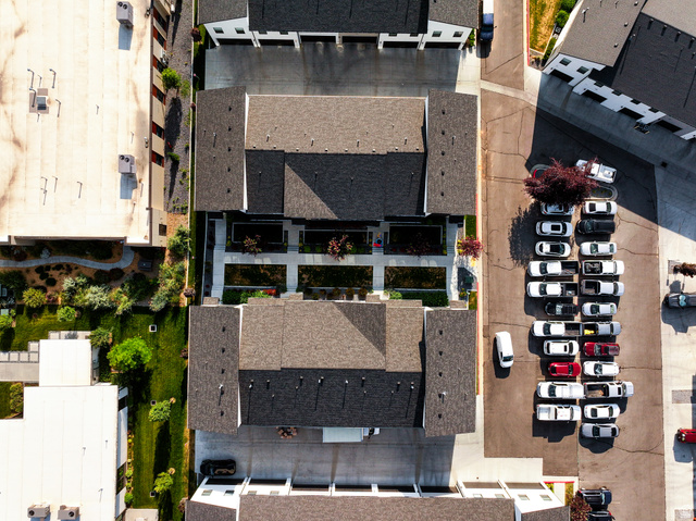 220 Spring Creek Parkway Providence, UT 84332 - Photo 9 of 26 Overhead perspective of residential structures featuring dark shingle roofing