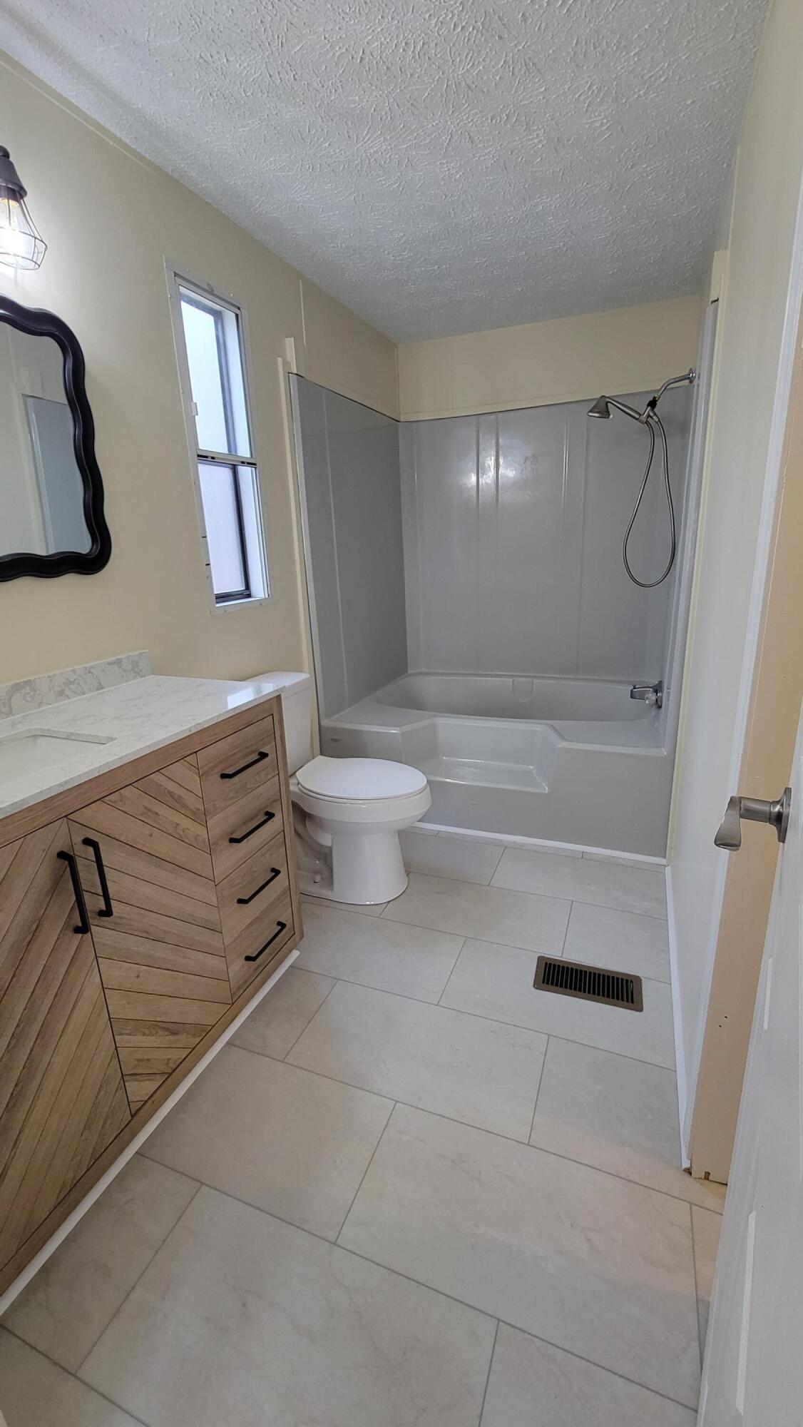 4350 Mountain View Church Road Blue Ridge, VA 24064 - Photo 12 of 30 a bathroom with a toilet sink and shower