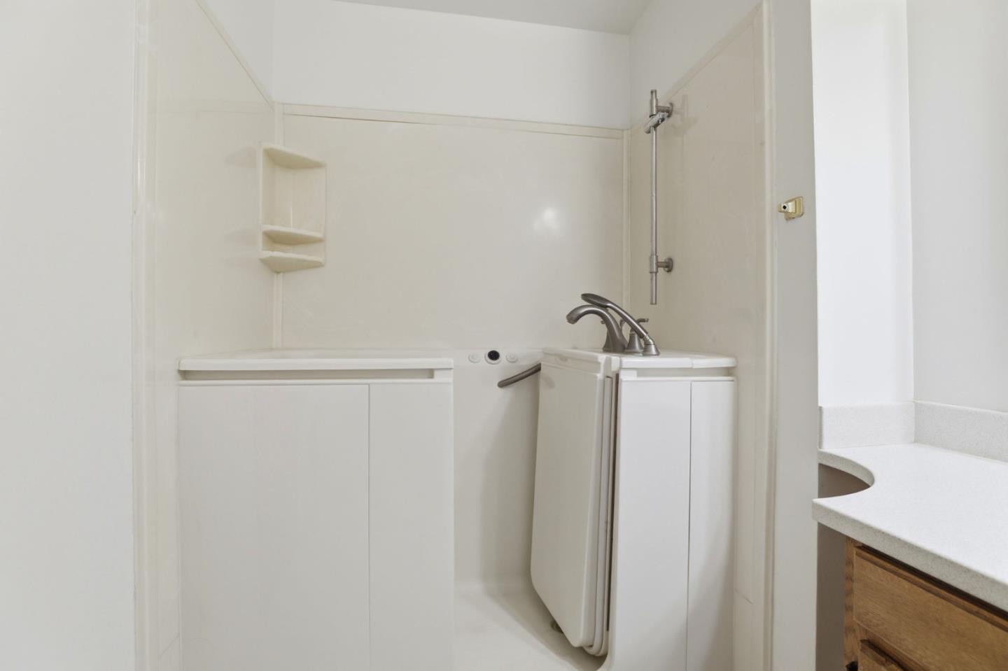 208 Mill Creek Road Fremont, CA 94539 - Photo 29 of 59 a bathroom with a sink and mirror