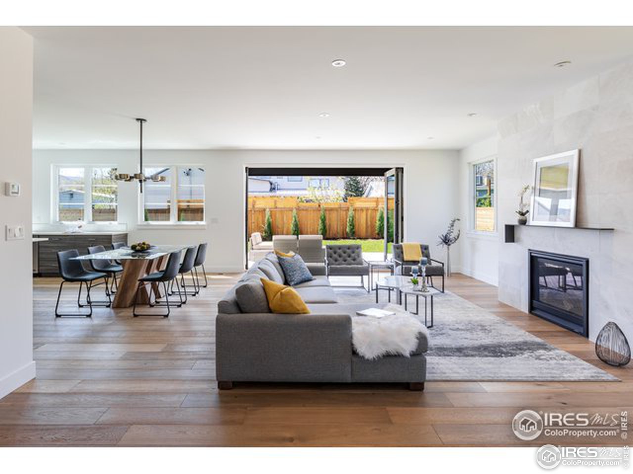 3025 18th Street Boulder, CO 80304 - Photo 1 of 35 a living room with furniture and a fireplace