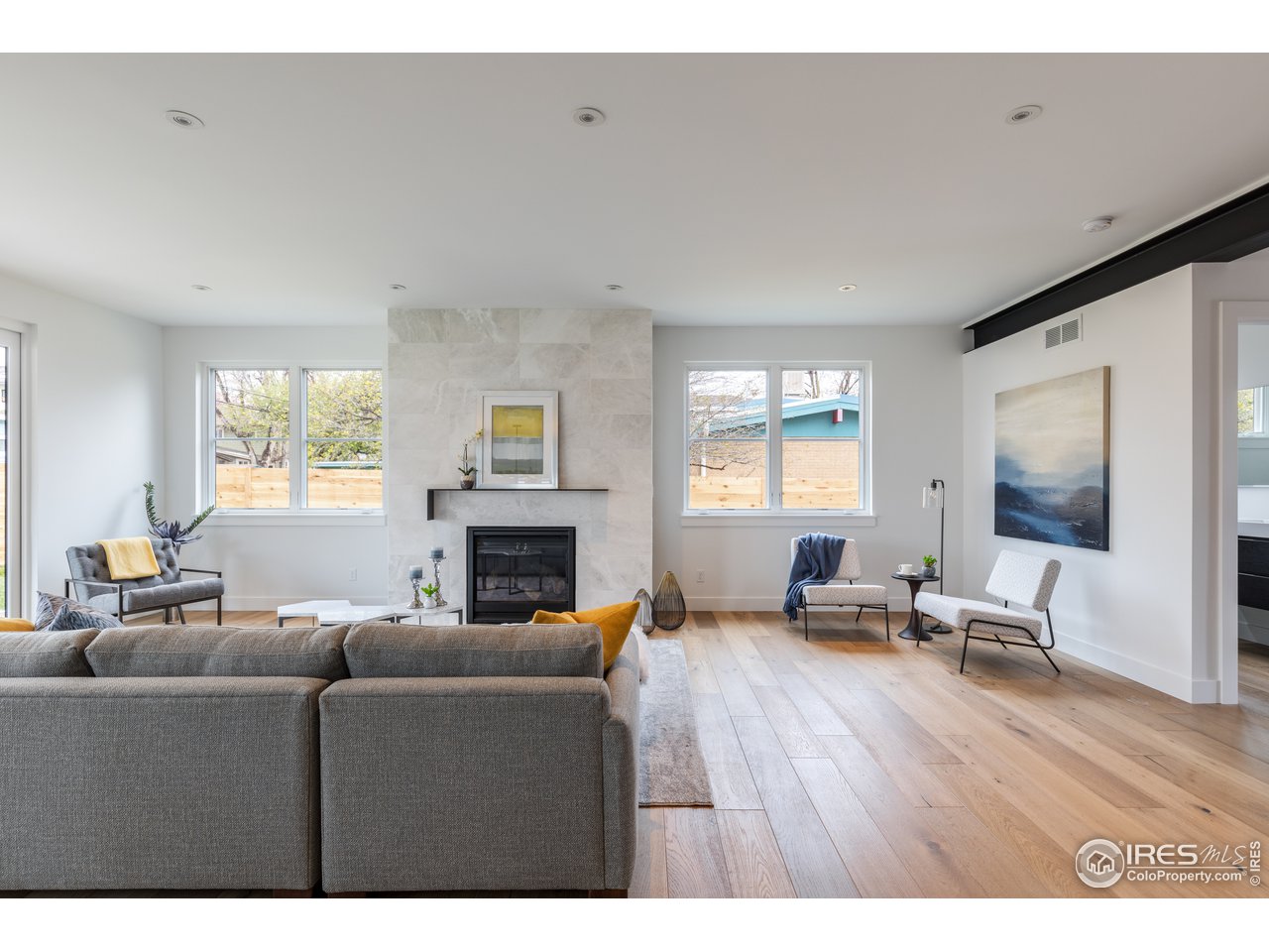 3025 18th Street Boulder, CO 80304 - Photo 11 of 35 a living room with furniture window and wooden floor