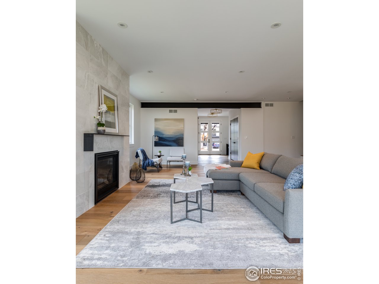 3025 18th Street Boulder, CO 80304 - Photo 12 of 35 a living room with furniture and a fireplace