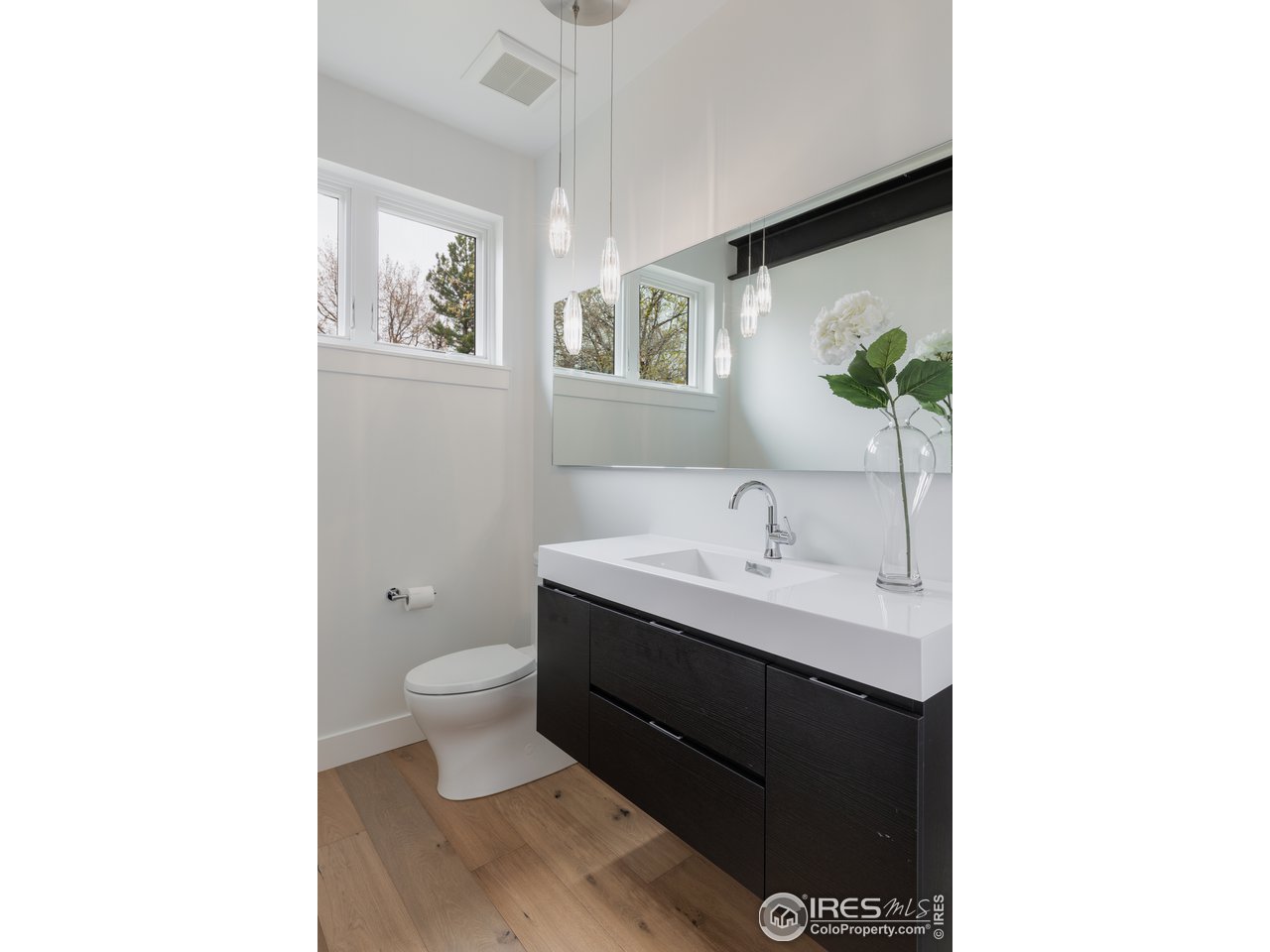 3025 18th Street Boulder, CO 80304 - Photo 14 of 35 a bathroom with a sink and a toilet
