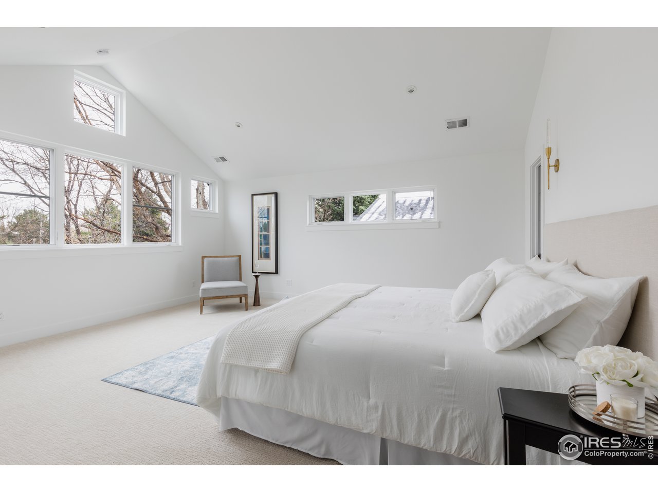 3025 18th Street Boulder, CO 80304 - Photo 19 of 35 a bedroom with a bed and with view of bathroom
