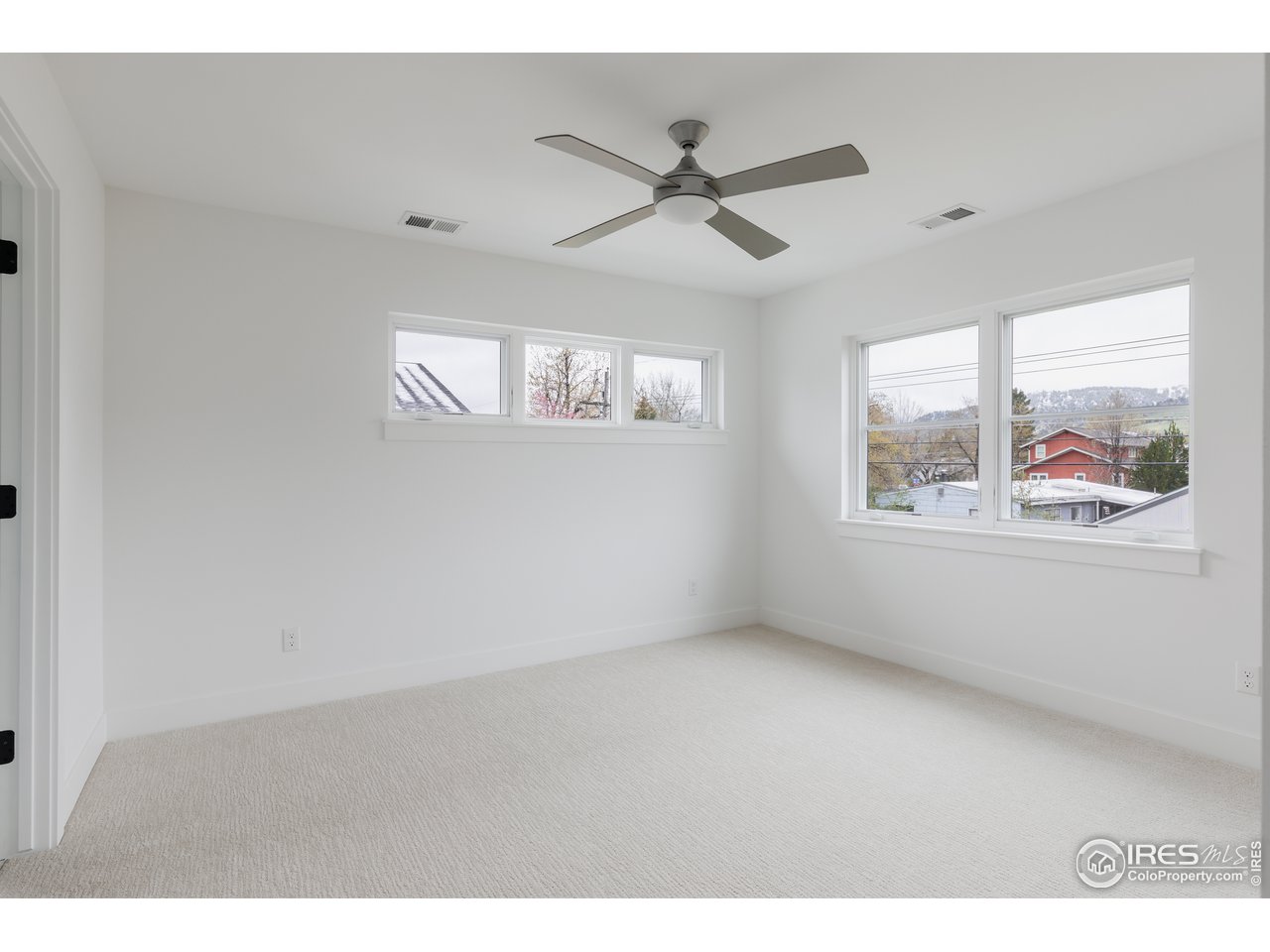 3025 18th Street Boulder, CO 80304 - Photo 27 of 35 a view of an empty room with a window