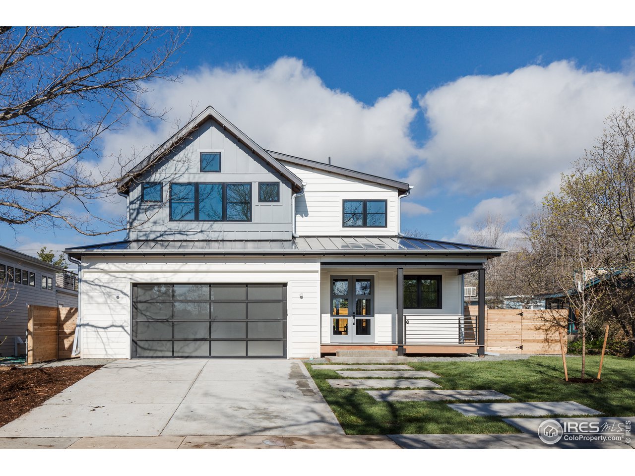 3025 18th Street Boulder, CO 80304 - Photo 3 of 35 front view of a house with a yard