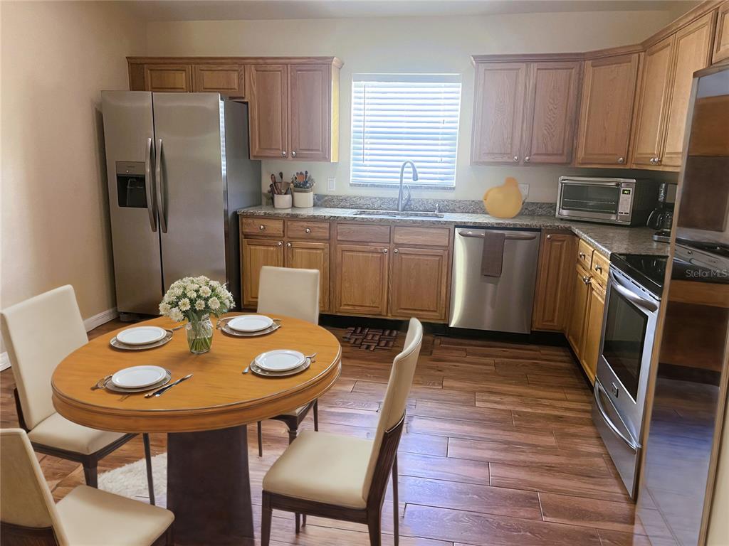 26513 Glaspell Road Punta Gorda, FL 33955 - Photo 6 of 31 Staged Eat in Kitchen