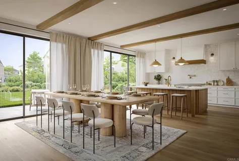 a view of a dining room with furniture and window