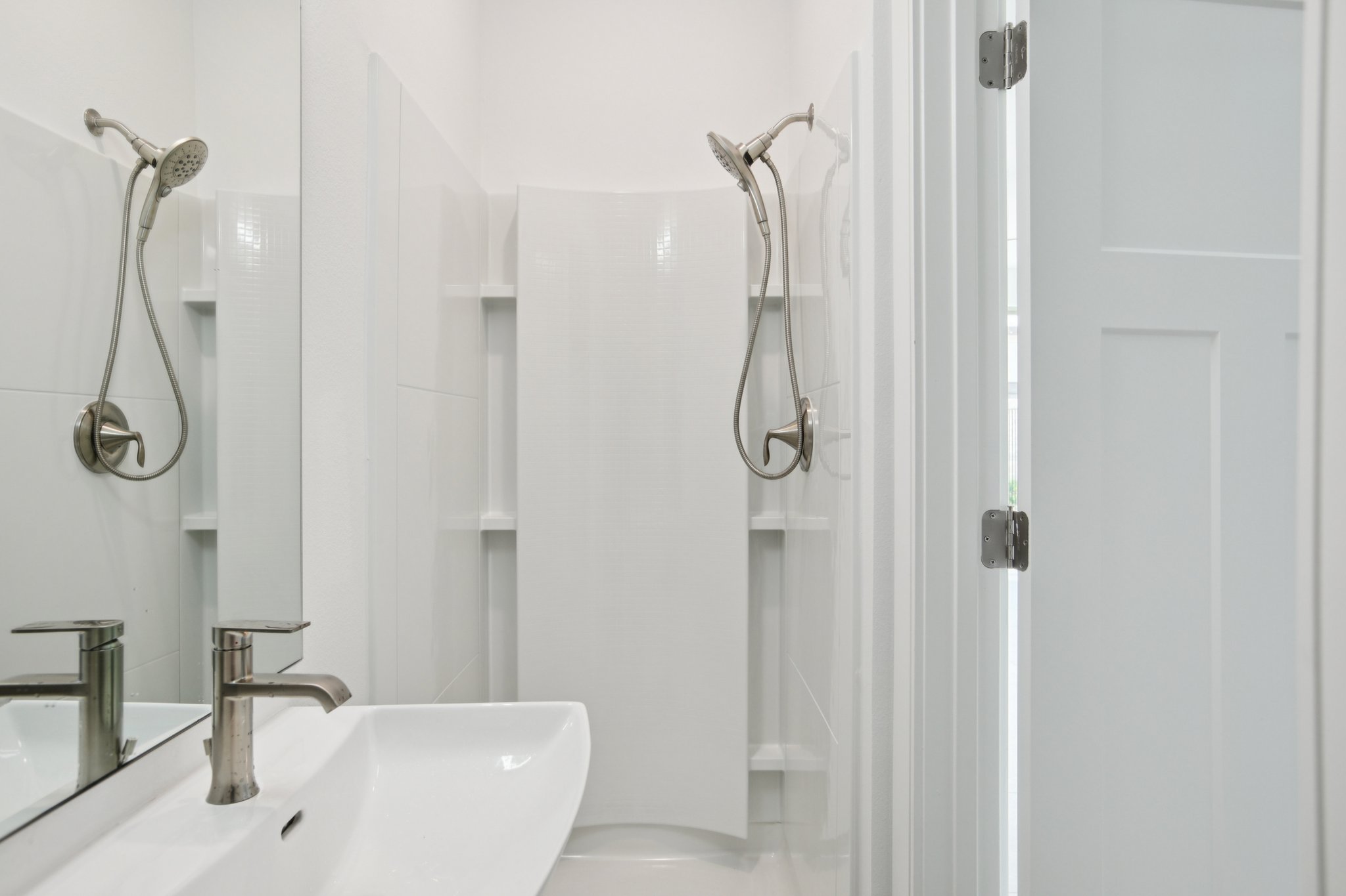 302 Tesla Circle Austin, TX 78681 - Photo 17 of 40 a bathroom with a shower and a shower