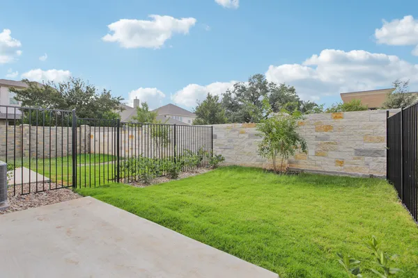 a view of a backyard with a garden