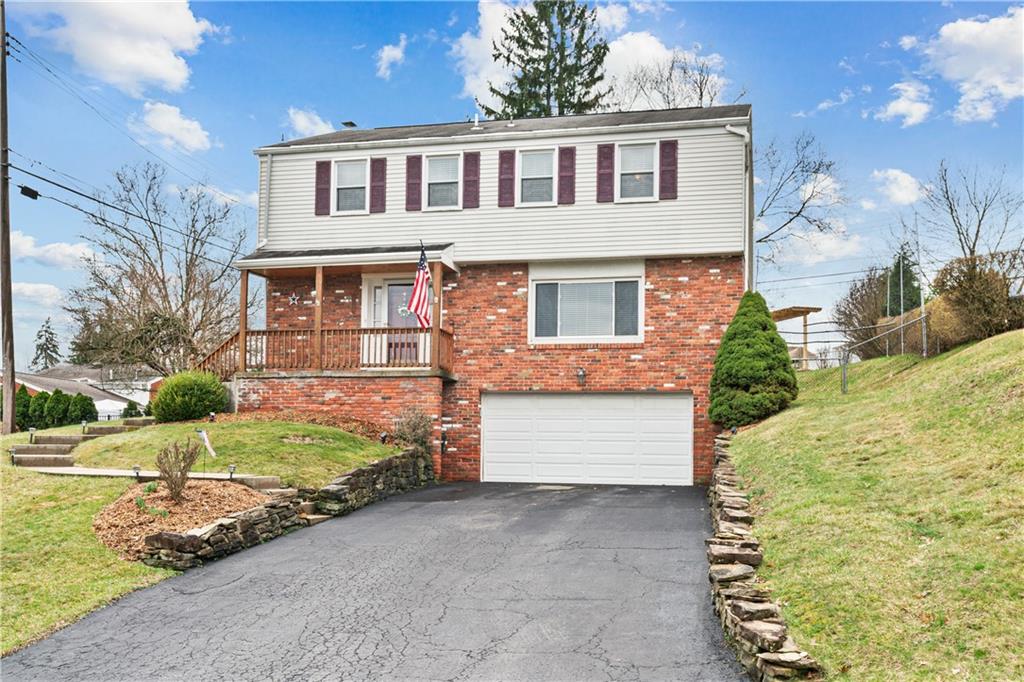 5140 Raintree Drive Pittsburgh, PA 15236 - Photo 26 of 26 a front view of a house with a yard
