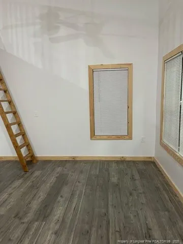 a view of entryway and kitchen