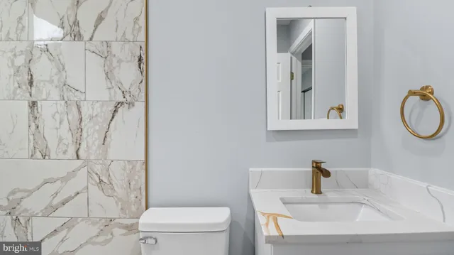 a bathroom with a sink and a toilet