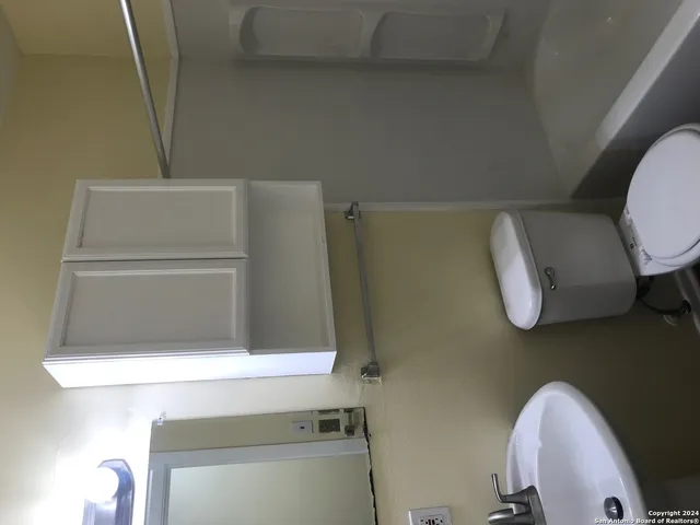 a bathroom with a toilet
