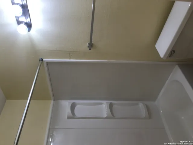 a bathroom with a window