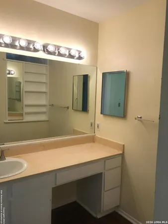 a view of a room with racks on the wall