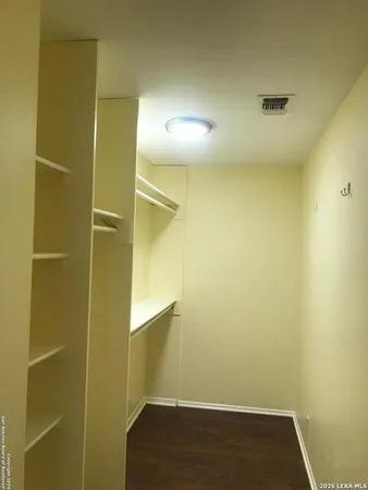 a view of a room with a door