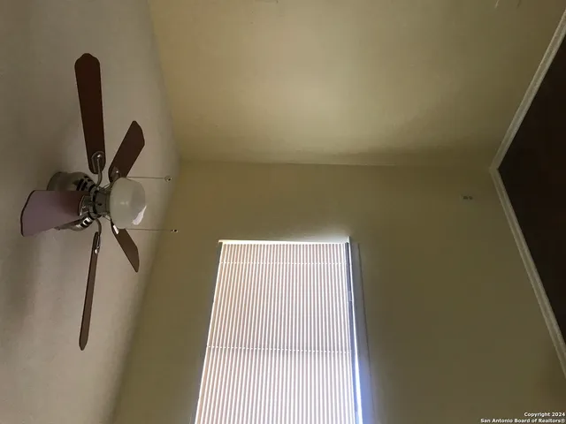 a view of a room with a door