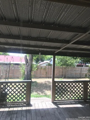 a view of outdoor space with a swing