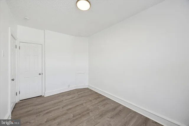 a view of small space with wooden floor